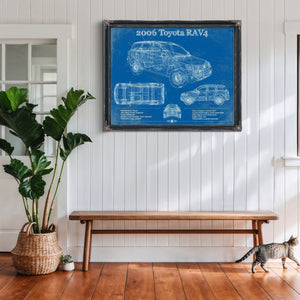 2006 Toyota Rav4 Blueprint Art Print framed in Vintage Black above a rustic console table