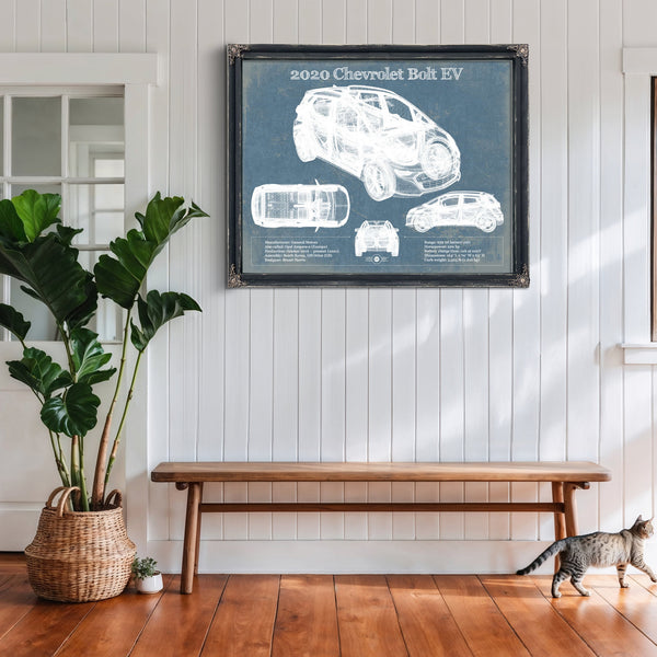 2020 Chevy Bolt EV Blueprint Art Print framed in Vintage Black above a rustic console table