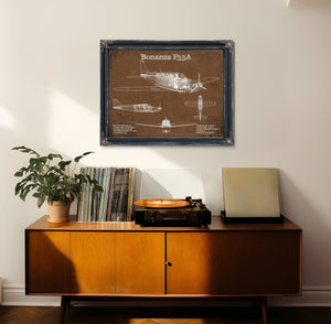 Beechcraft Bonanza F33A Blueprint Airplane Print framed in Vintage Black in a loft bedroom