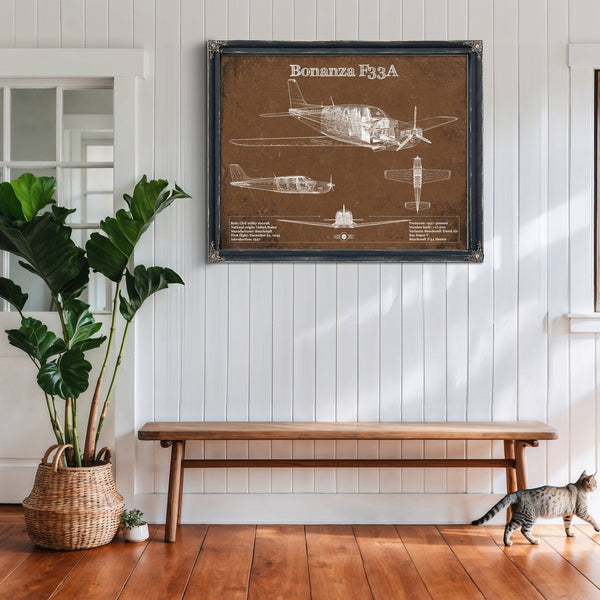 Beechcraft Bonanza F33A Blueprint Airplane Print framed in Vintage Black above a rustic console table