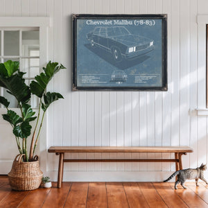 Chevrolet Malibu 78-83 Blueprint Art Print framed in Vintage Black above a rustic console table
