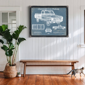 Chevy C10 Pickup 2nd Generation Print framed in Vintage Black above a rustic console table