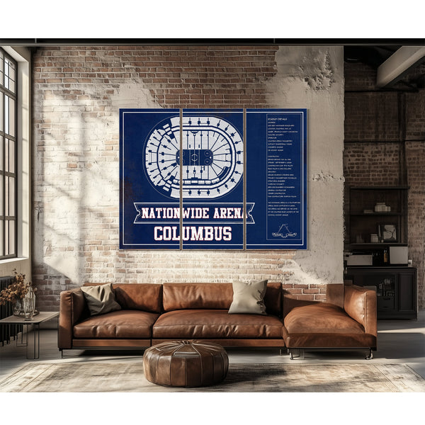 Columbus Blue Jackets Nationwide Arena Seating Print as a 3 panel canvas wrap above a leather sofa