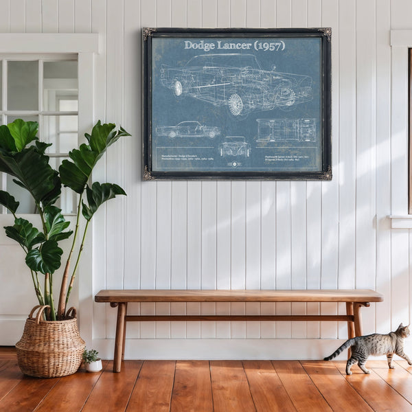 1957 Dodge Lancer Blueprint Art Print framed in Vintage Black above a rustic console table