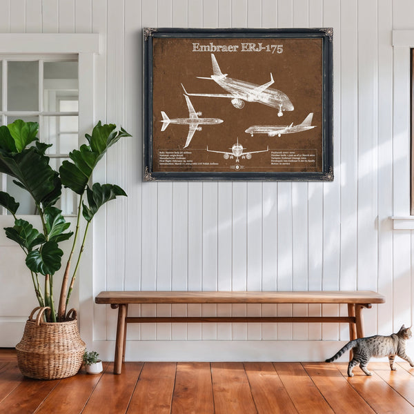 Embraer ERJ-175 Aviation Blueprint with Optional Print framed in Vintage Black above a rustic console table