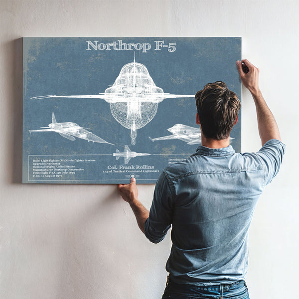 F-5 Tiger Jet Blueprint Aircraft Print framed in Vintage Black above a mid-century record console