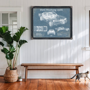 1966 Ford Mustang Blueprint Art Print framed in Vintage Black above a rustic console table