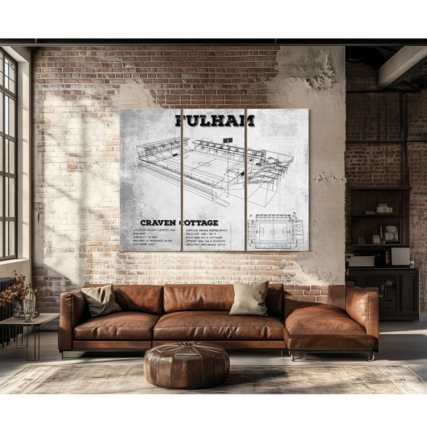 Fulham Football Club Craven Cottage Stadium Print as a 3 panel canvas wrap above a leather sofa