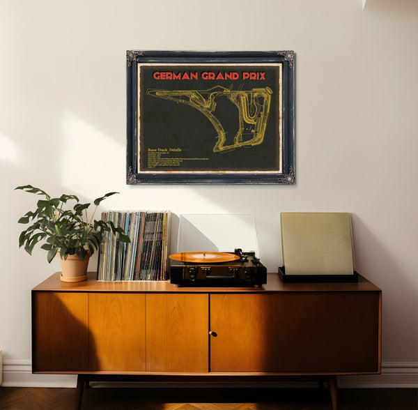 German Grand Prix Blueprint Race Track Print framed in Vintage Black in a loft bedroom