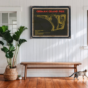 German Grand Prix Blueprint Race Track Print framed in Vintage Black above a rustic console table