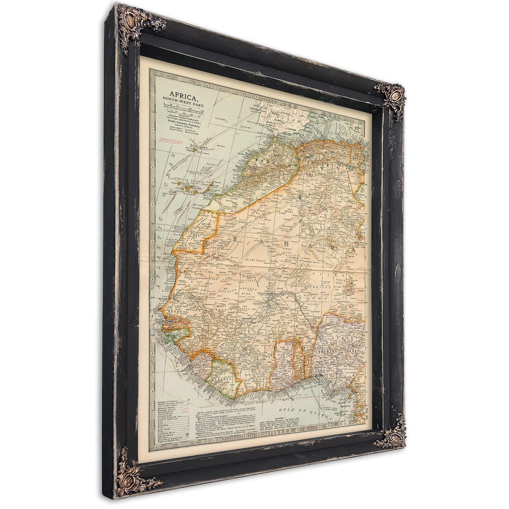 Cutler West Vintage map of northwestern Africa in black wood frame with ornate corners, sepia background