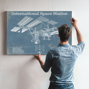 International Space Station Space Exploration Print framed in Vintage Black above a mid-century record console