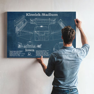 Iowa Hawkeyes football Kinnick Stadium Print framed in Vintage Black above a mid-century record console