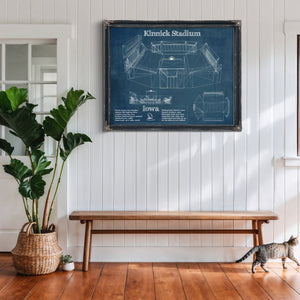 Iowa Hawkeyes football Kinnick Stadium Print framed in Vintage Black above a rustic console table
