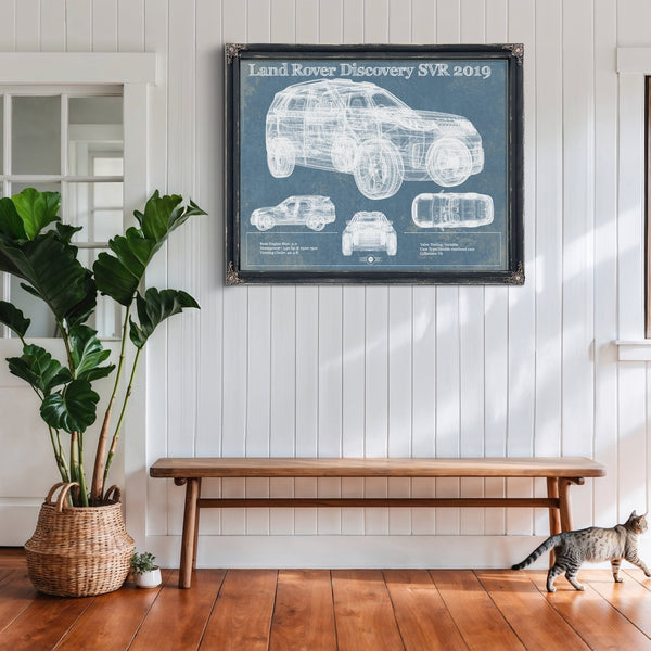 Land Rover Defender SVX Blueprint Truck Print framed in Vintage Black above a rustic console table