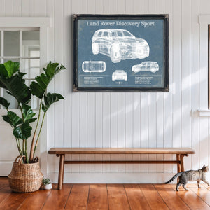 Land Rover Discovery Blueprint Art Print framed in Vintage Black above a rustic console table