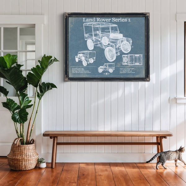 Land Rover Series Blueprint Art Print framed in Vintage Black above a rustic console table