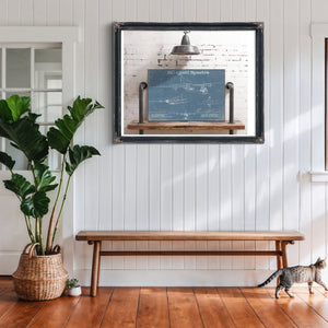 Lockheed AC-130H Spectre Blueprint Aviation Print framed in Vintage Black above a rustic console table