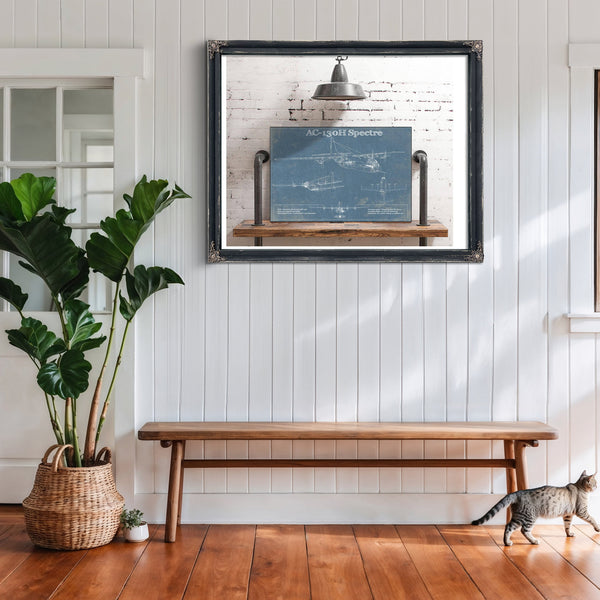 Lockheed AC-130H Spectre Blueprint Aviation Print framed in Vintage Black above a rustic console table