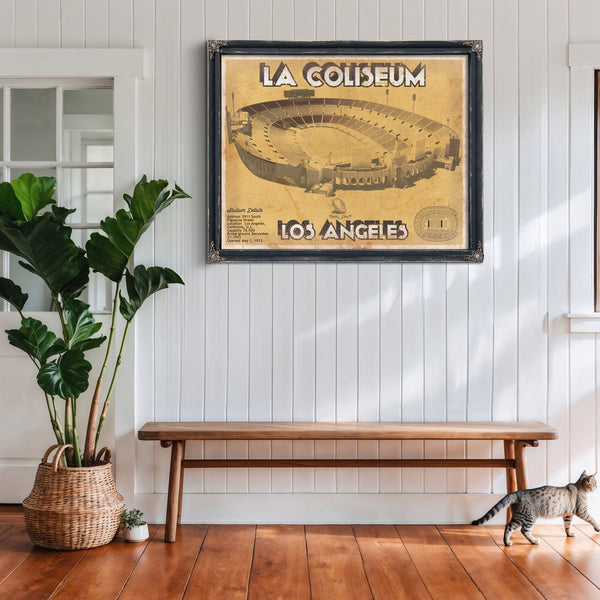 Los Angeles Rams LA Coliseum Seating Stadium Print framed in Vintage Black above a rustic console table