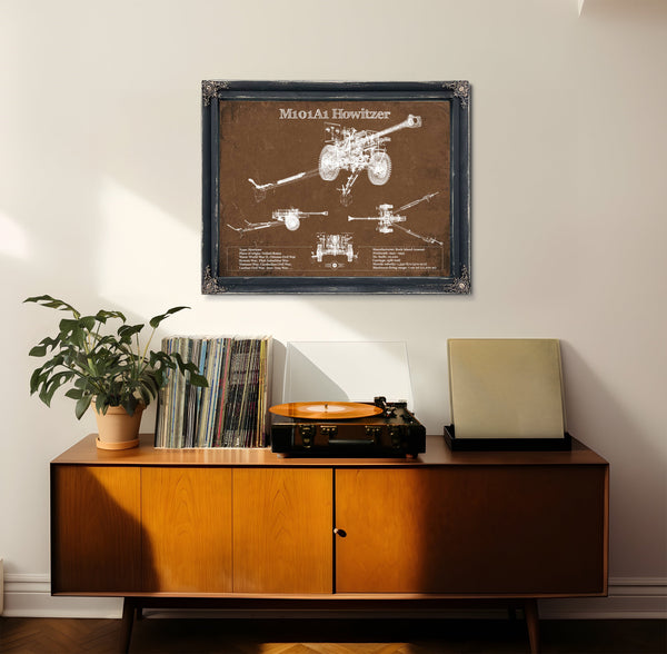 M101A1 Howitzer Art Print framed in Vintage Black in a loft bedroom