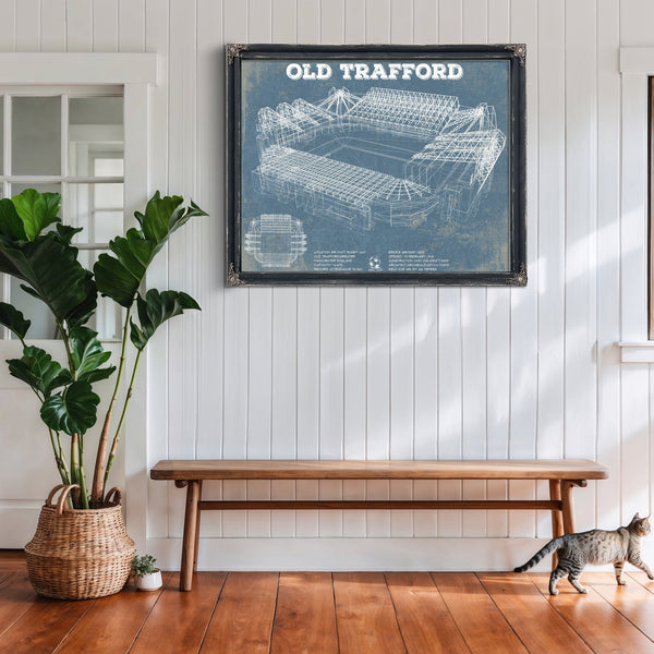 Manchester United FC - Old Trafford Stadium Print framed in Vintage Black above a rustic console table