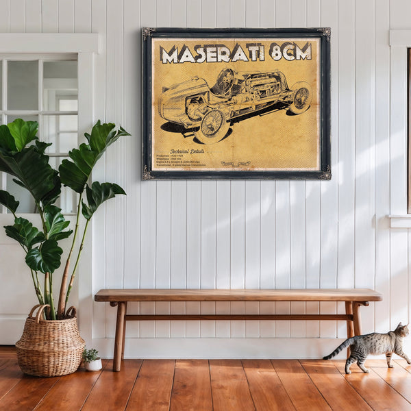 Maserati 8CM Blueprint Art Print framed in Vintage Black above a rustic console table
