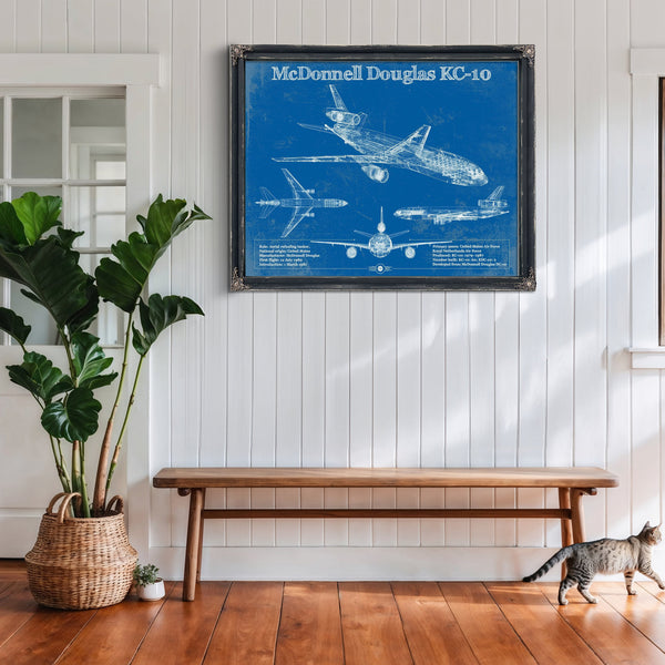McDonnell Douglas KC-10 Extender Print framed in Vintage Black above a rustic console table