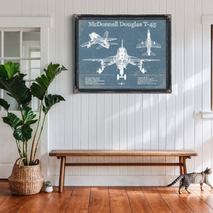 McDonnell Douglas T-45 Goshawk Print framed in Vintage Black above a rustic console table