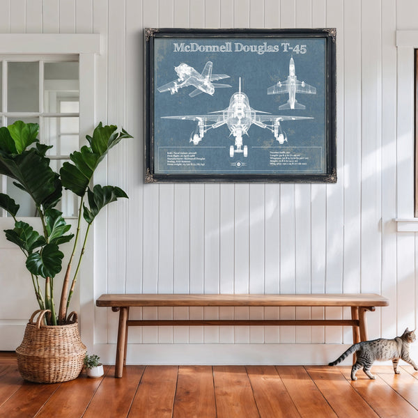McDonnell Douglas T-45 Goshawk Print framed in Vintage Black above a rustic console table