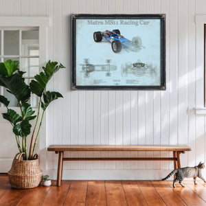 Mclaren M1b Blueprint Art Print framed in Vintage Black above a rustic console table