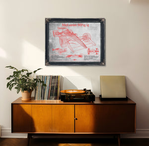 McLaren MP4-4 - Red and White Version Formula One Print framed in Vintage Black in a loft bedroom