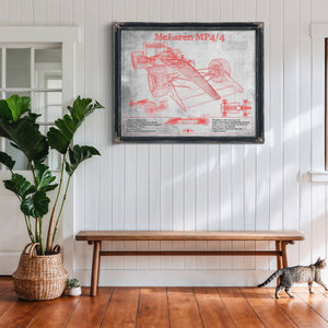 McLaren MP4-4 - Red and White Version Formula One Print framed in Vintage Black above a rustic console table
