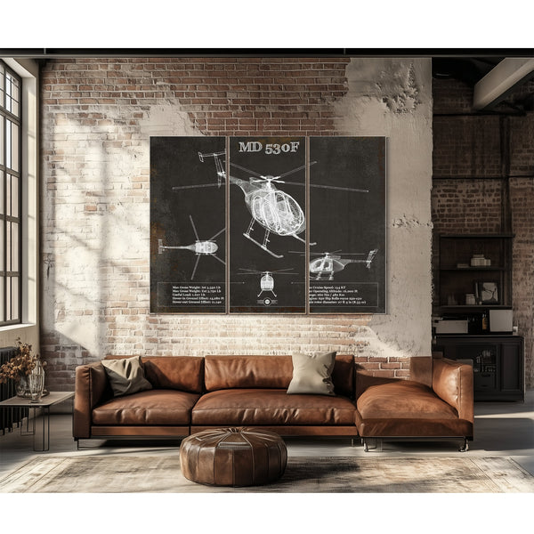 MD 530F Helicopter Blueprint Aviation Print as a 3 panel canvas wrap above a leather sofa