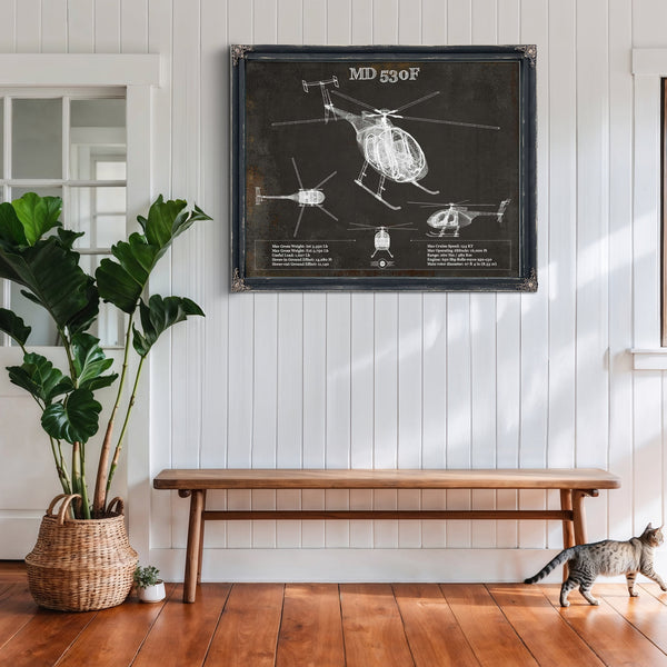 MD 530F Helicopter Blueprint Aviation Print framed in Vintage Black above a rustic console table