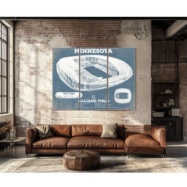 Minnesota United - Allianz Field MLS Stadium Print as a 3 panel canvas wrap above a leather sofa