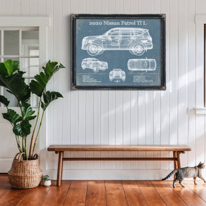2020 Nissan Patrol Ti L Blueprint Art Print framed in Vintage Black above a rustic console table
