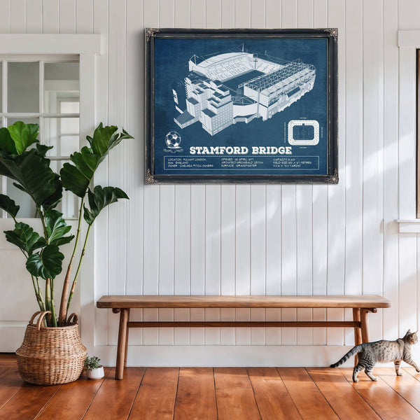 Stamford Bridge Chelsea FC European Football Soccer Stadium Print framed in Vintage Black above a rustic console table