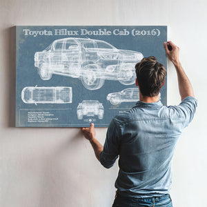 2016 Toyota Hilux Double Cab Blueprint Truck Print framed in Vintage Black above a mid-century record console