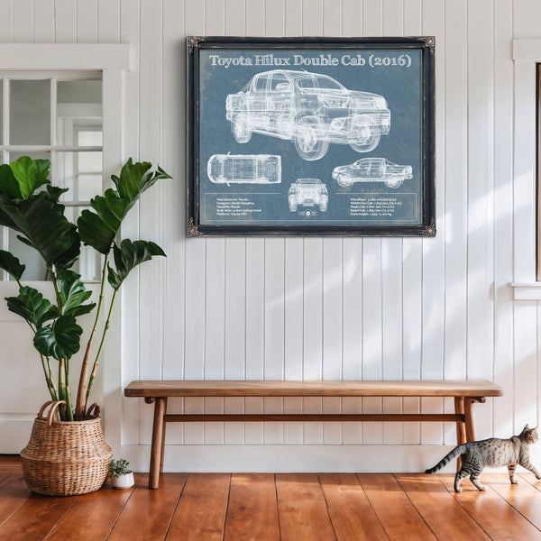2016 Toyota Hilux Double Cab Blueprint Truck Print framed in Vintage Black above a rustic console table