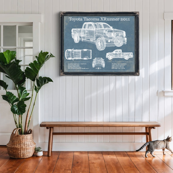 2011 Toyota Tacoma XRunner Blueprint Truck Print framed in Vintage Black above a rustic console table