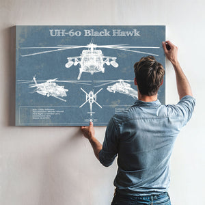 UH-60 Blackhawk Helicopter Print framed in Vintage Black above a mid-century record console