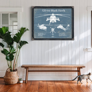 UH-60 Blackhawk Helicopter Print framed in Vintage Black above a rustic console table