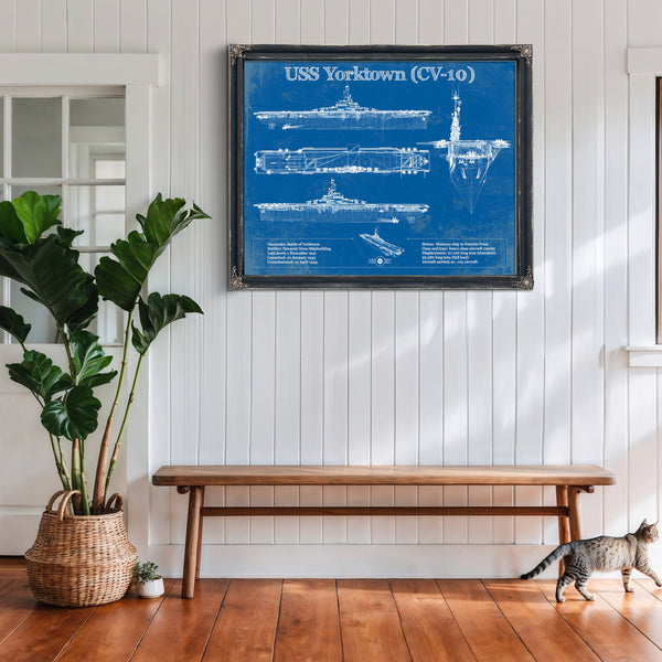 USS Yorktown (CV-10) Aircraft Carrier Print framed in Vintage Black above a rustic console table