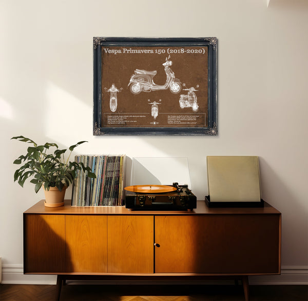 2018 - 2020 Vespa Primavera 150 Print framed in Vintage Black in a loft bedroom