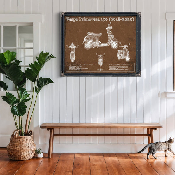 2018 - 2020 Vespa Primavera 150 Print framed in Vintage Black above a rustic console table