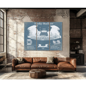 Washington Huskies Art Blue Version - Husky Stadium Print as a 3 panel canvas wrap above a leather sofa