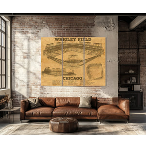 Wrigley Field Art - Chicago Cubs Stadium Print as a 3 panel canvas wrap above a leather sofa